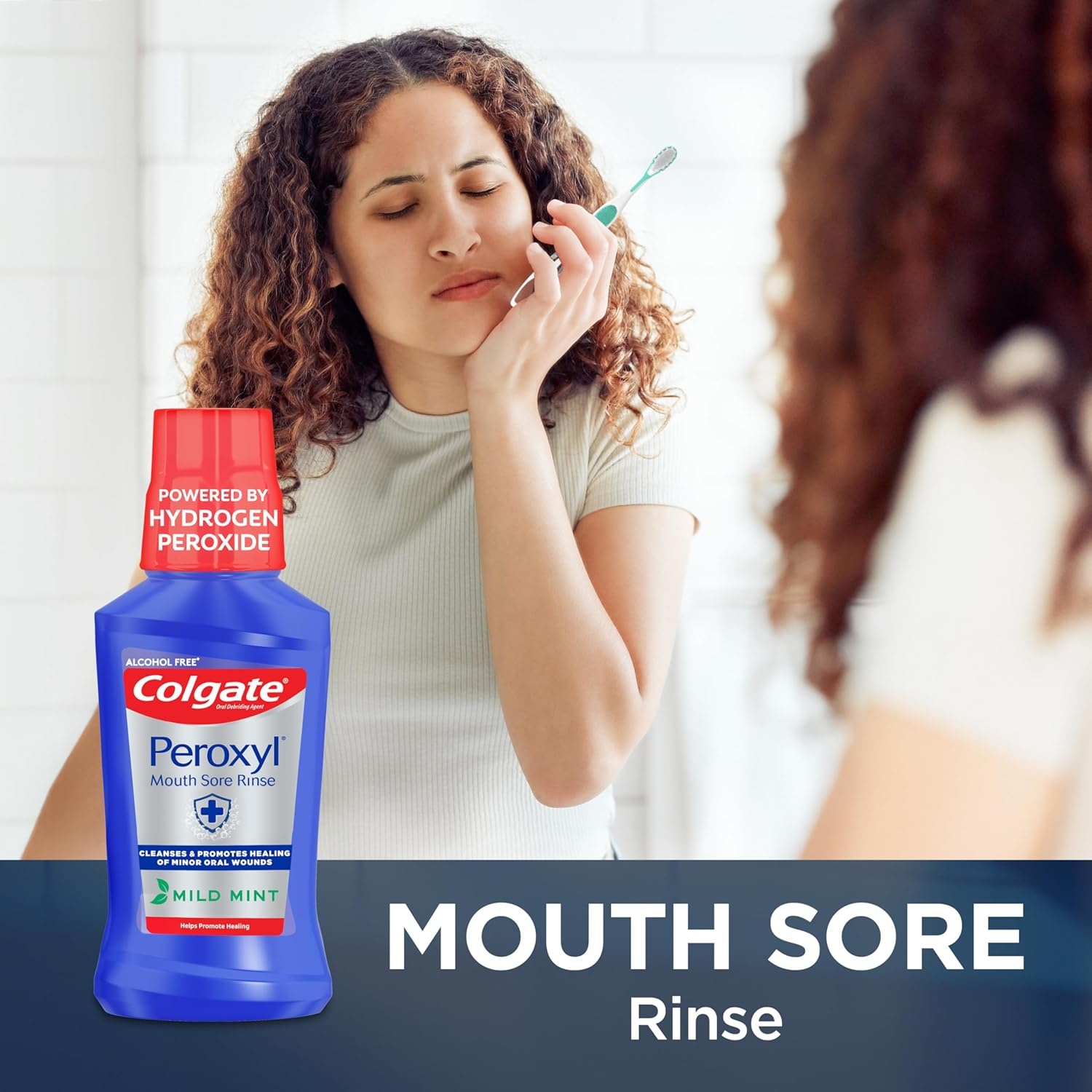 imageColgate Peroxyl Alcohol Free Mouthwash with 15 Hydrogen Peroxide Mouth Sore Rinse for Canker Sores Oral Irritations and Burns Mild Mint 84 fl oz Bottle1 Count Pack of 1