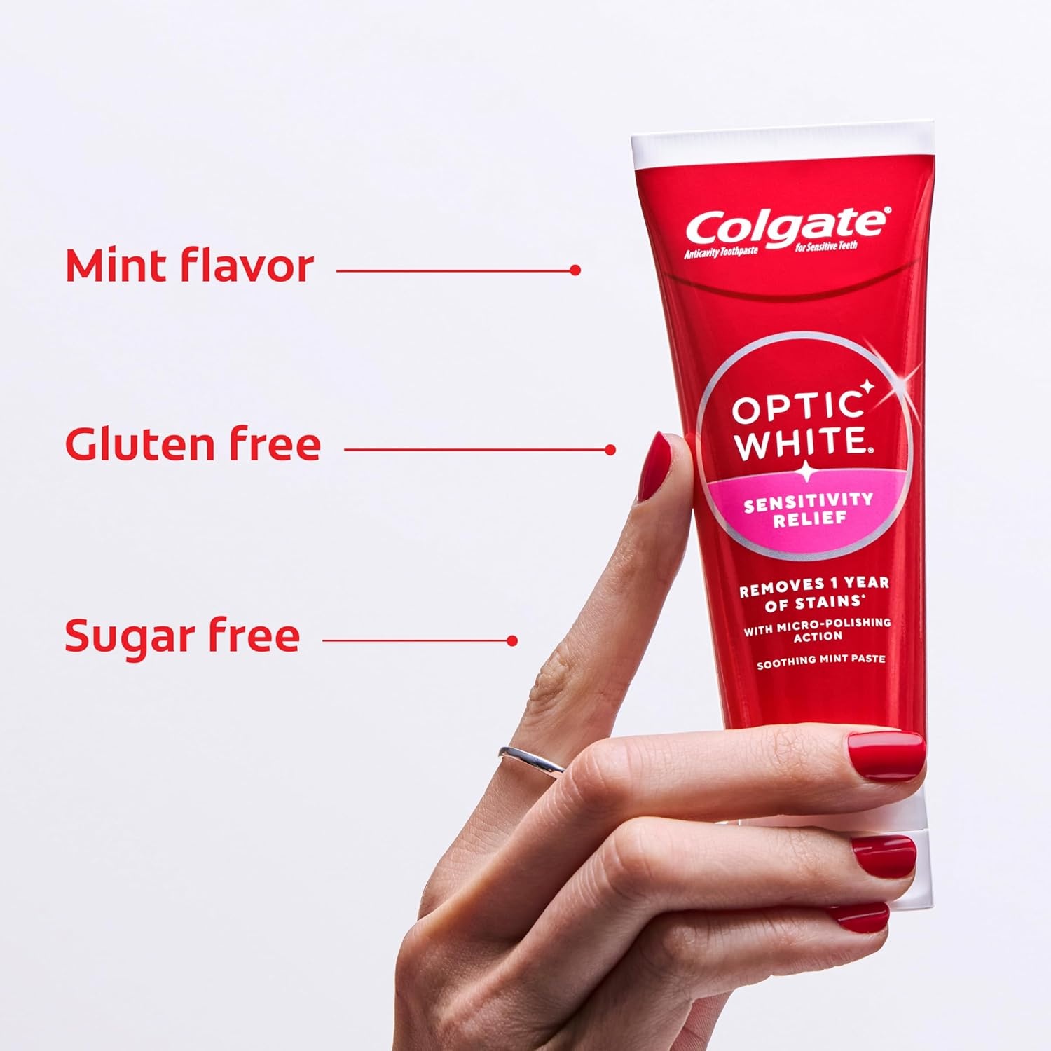 imageColgate Optic White Sensitivity Relief Teeth Whitening Toothpaste 3 Pack Anticavity Toothpaste for Sensitive Teeth Fluoride Enamel Safe Soothing Mint Flavor 38 OZ